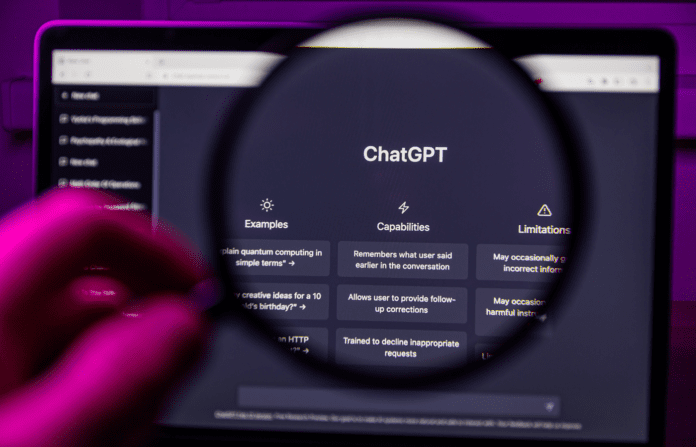 Chat GPT OpenAI through magnifying glass on screen.